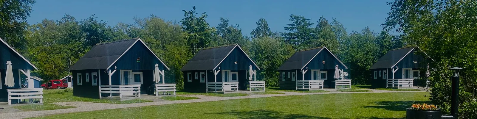 Familier ved stranden nær Hummingen Camping